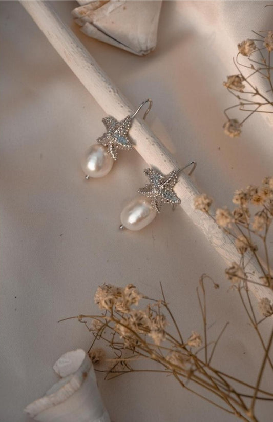 Orecchini stella marina con perla