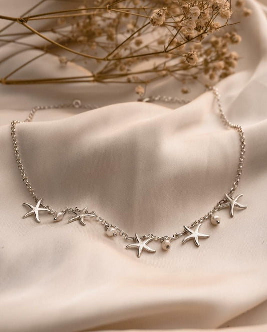 Collana con stelle marine e perle